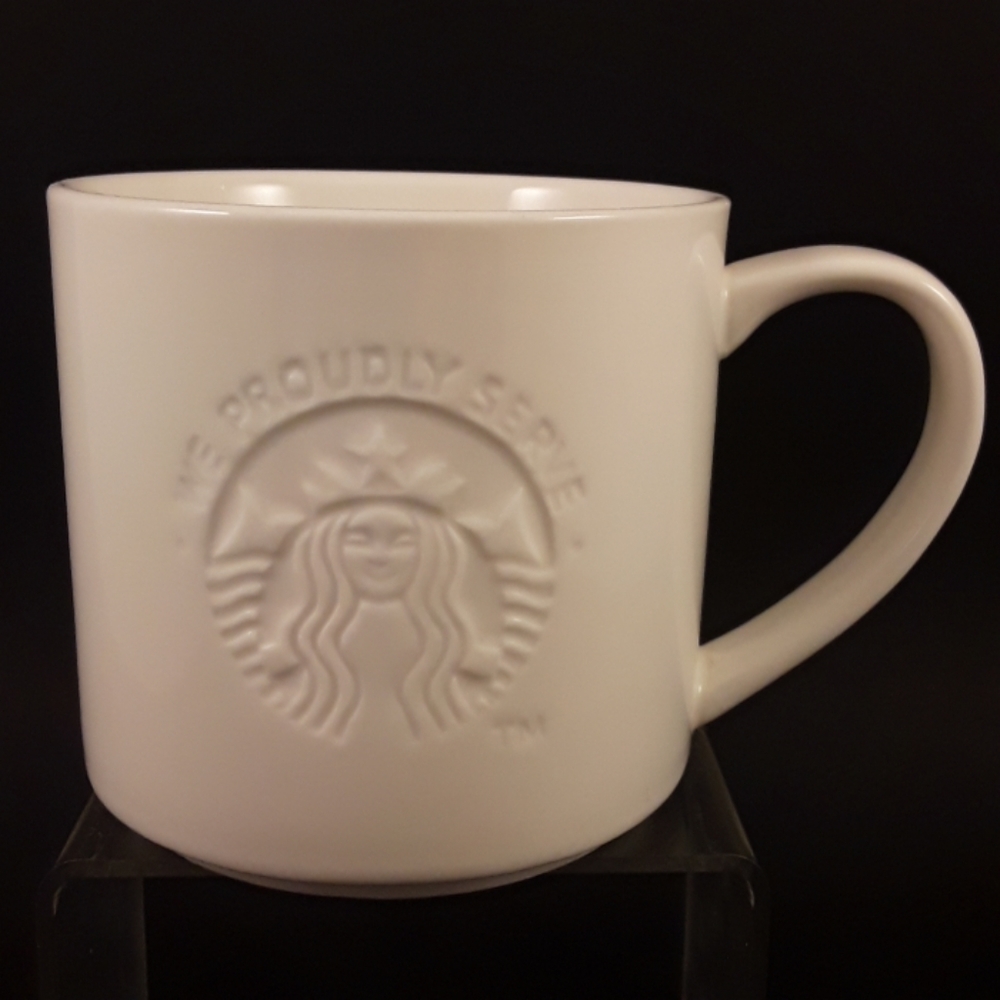 Starbucks white 'We proudly serve" coffee cup mug